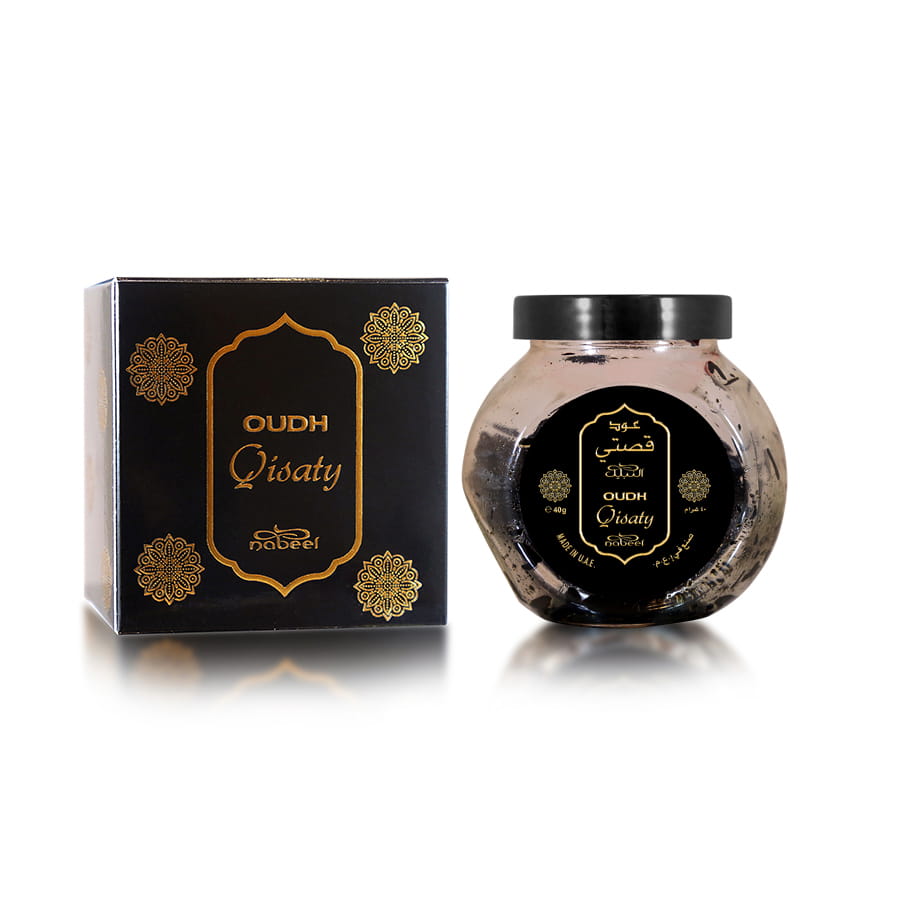 Oud Qisaty 40g Nabeel Perfume Black box decorated with gold and a glass jar containing the fragrance