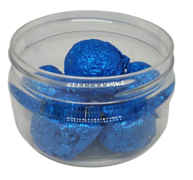 Natural Maroki Oud Daqa incense packaged in a clear plastic container with pieces wrapped in shiny blue paper
