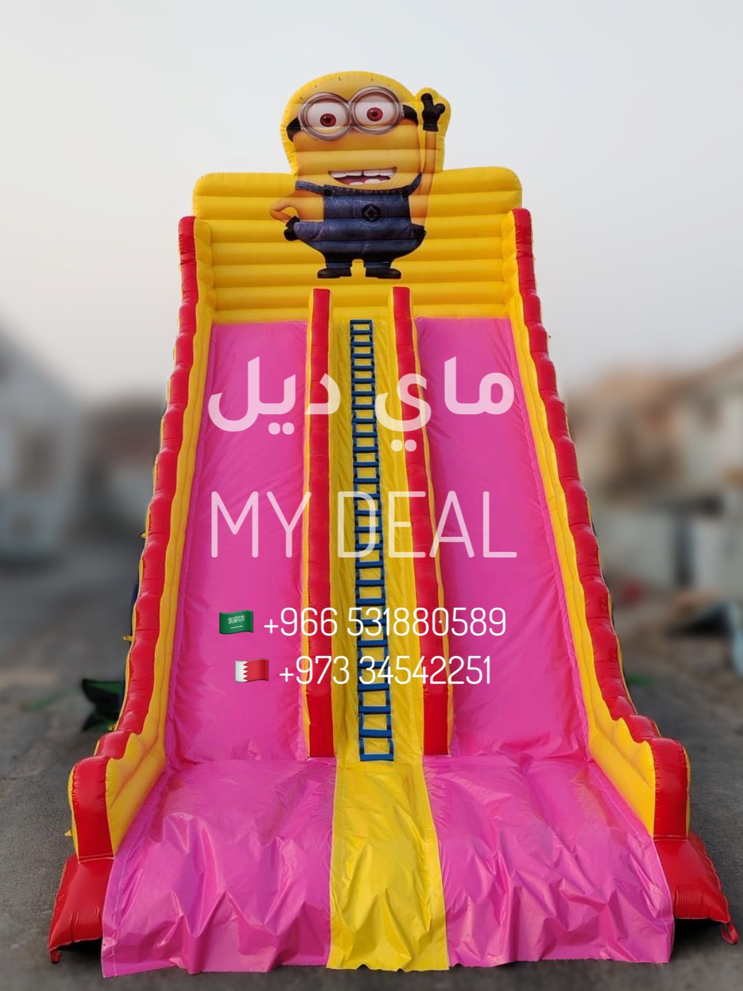 زحليقة هوائية شخصية مينيونز مسارين وسلم وسط واعمدة مشجرة  11*6*10.50متر 