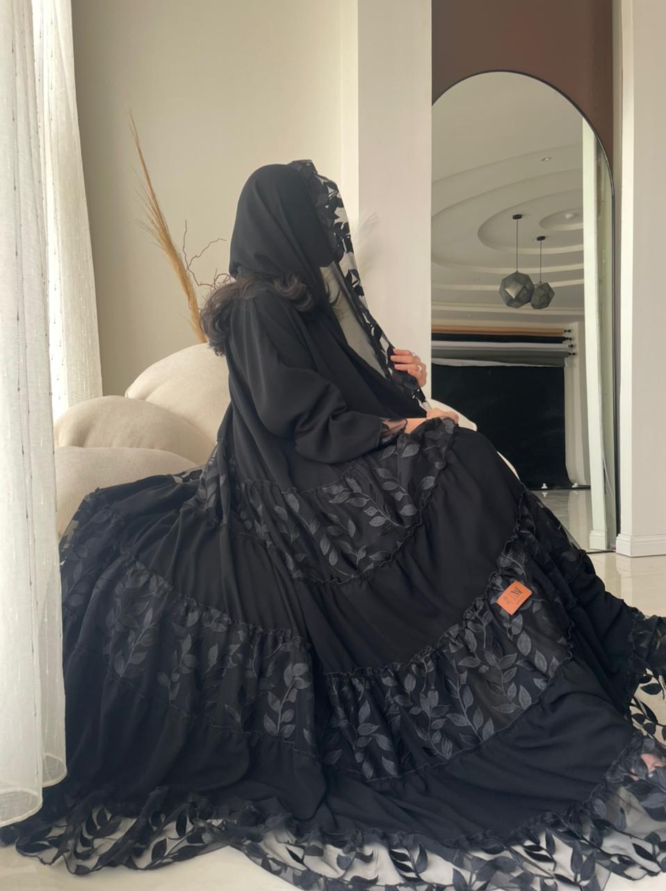 عبايه تل