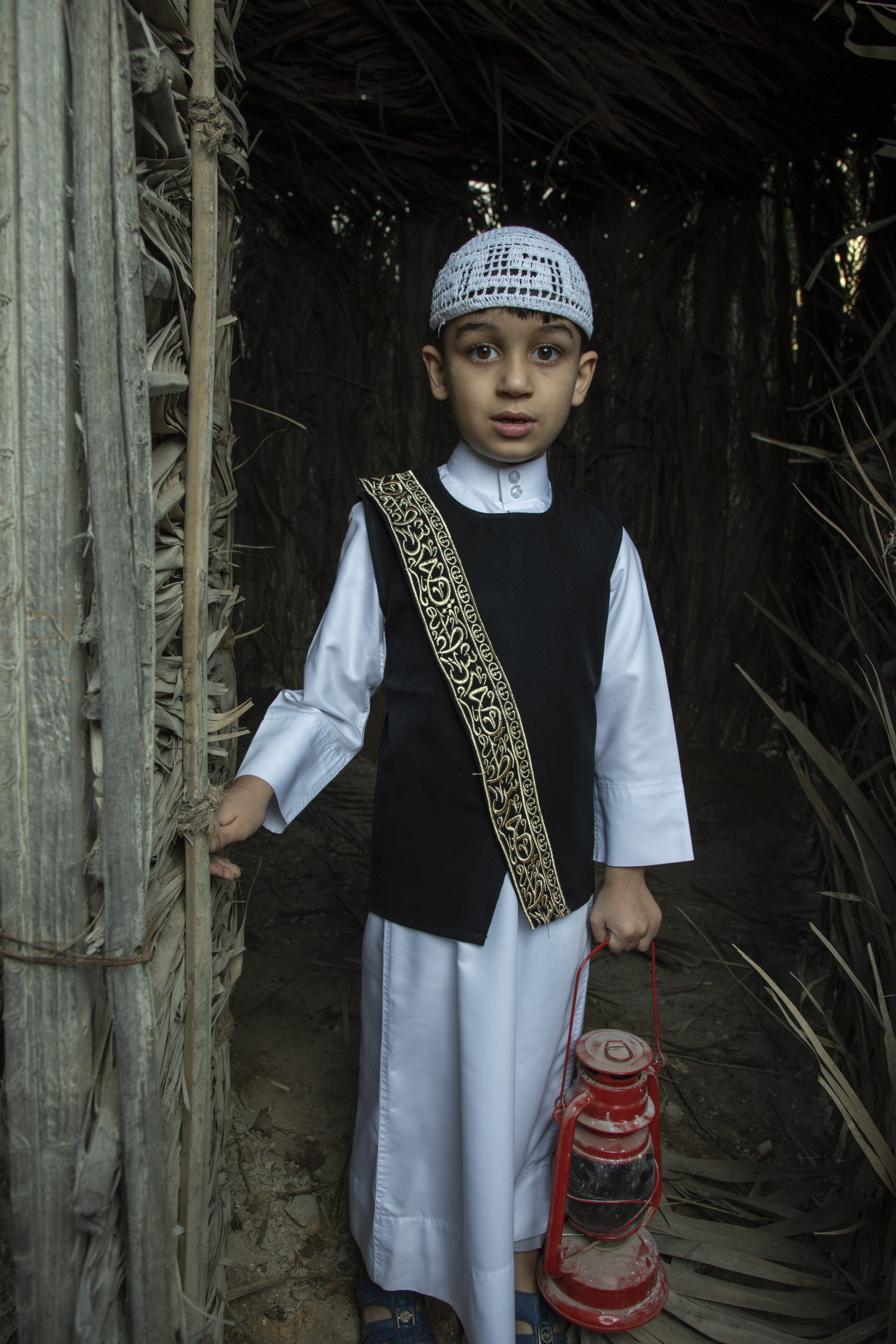 black suit for boys designed with arabic calligraphy