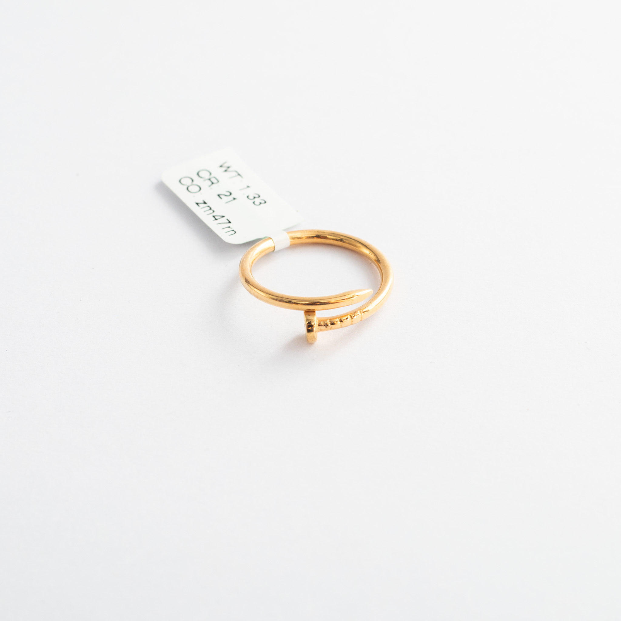 Gold ring with price tag