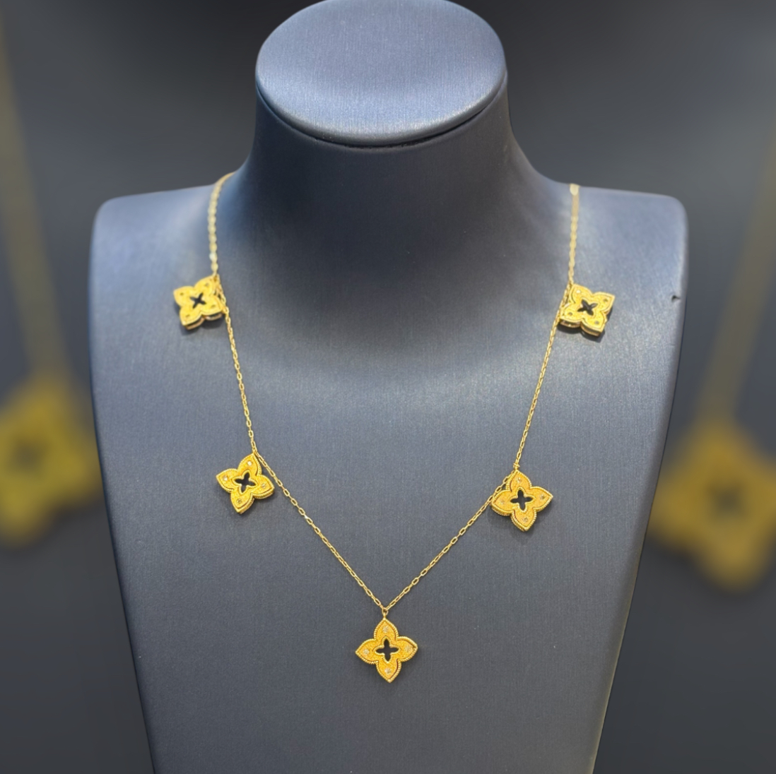 Golden necklace with beautiful flowers