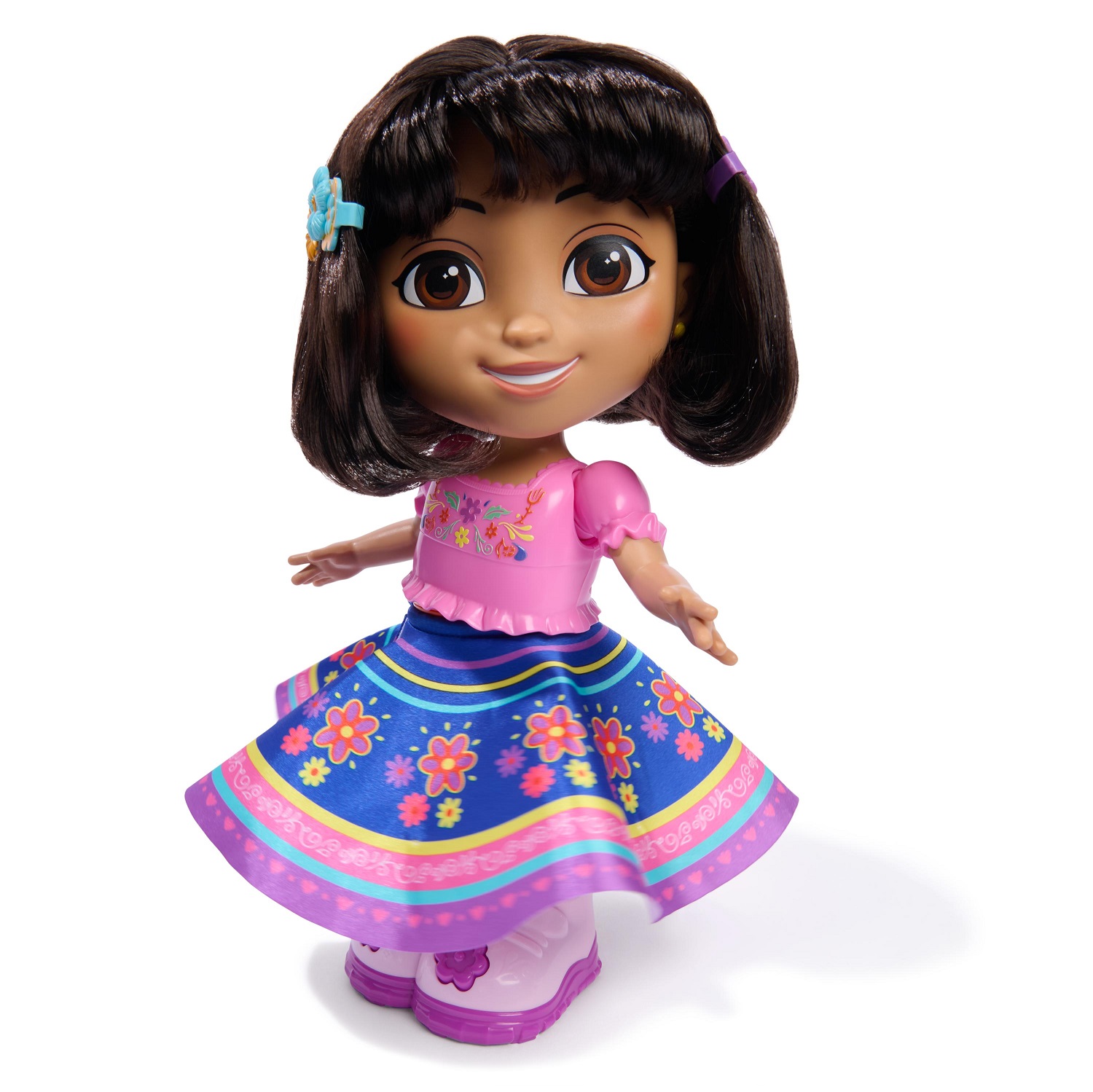 Girl interacting with Dora the Explorer doll in colorful outfit