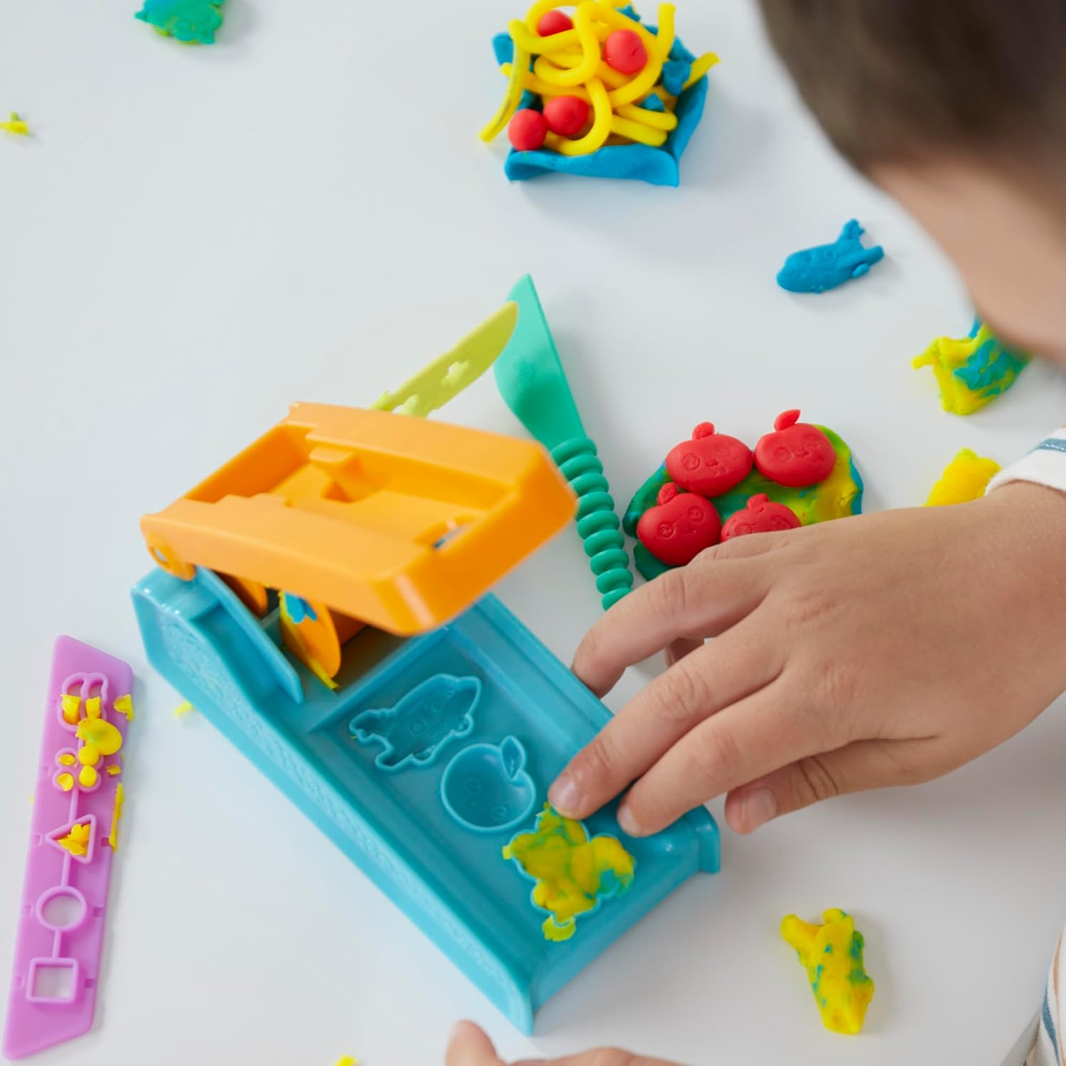 Colorful Play-Doh set with shaping tools