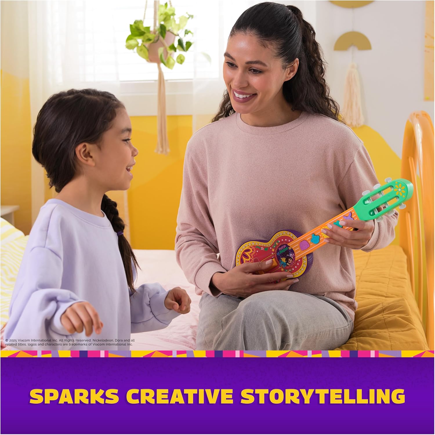 Colorful interactive guitar sized for little hands
