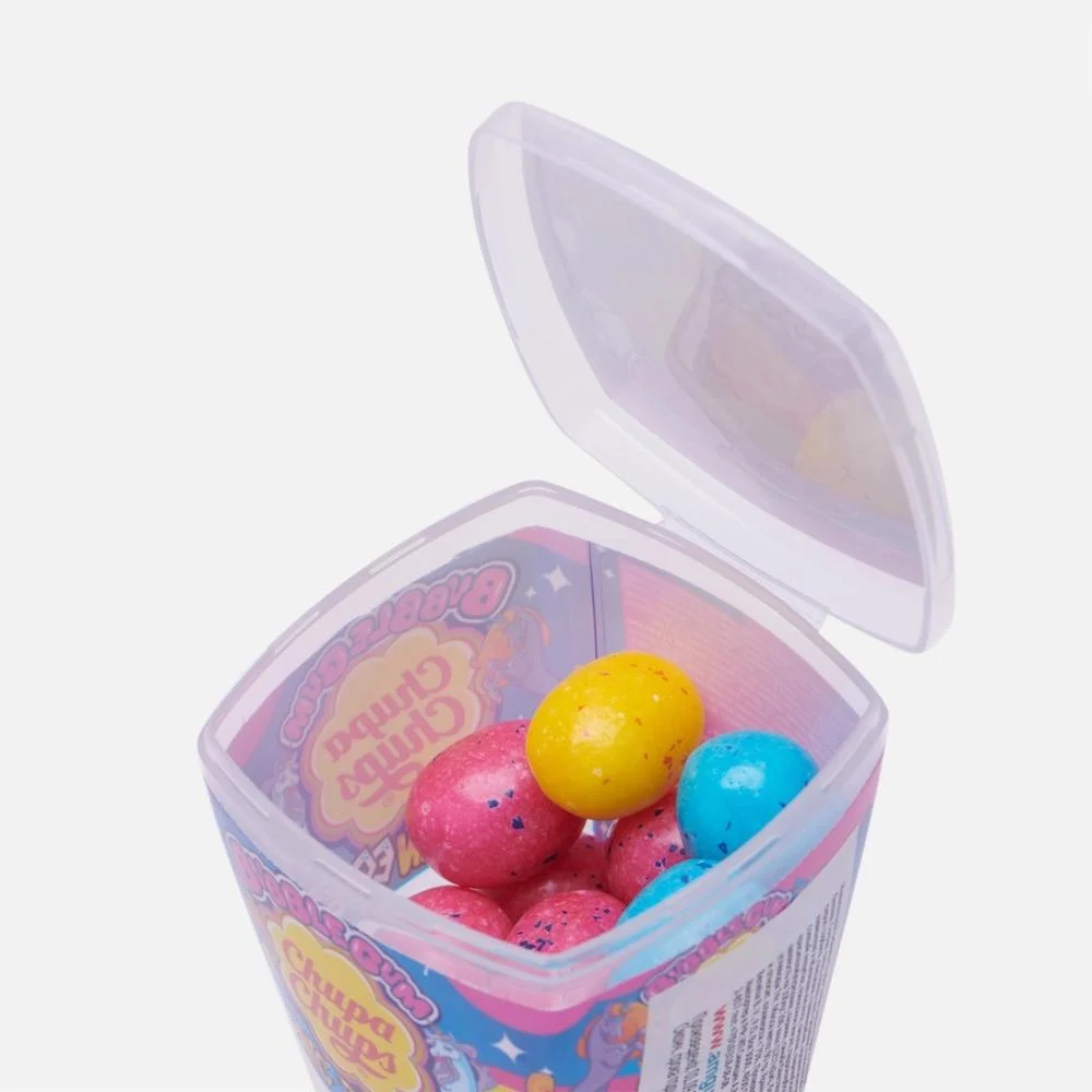 Transparent container with colorful candy eggs