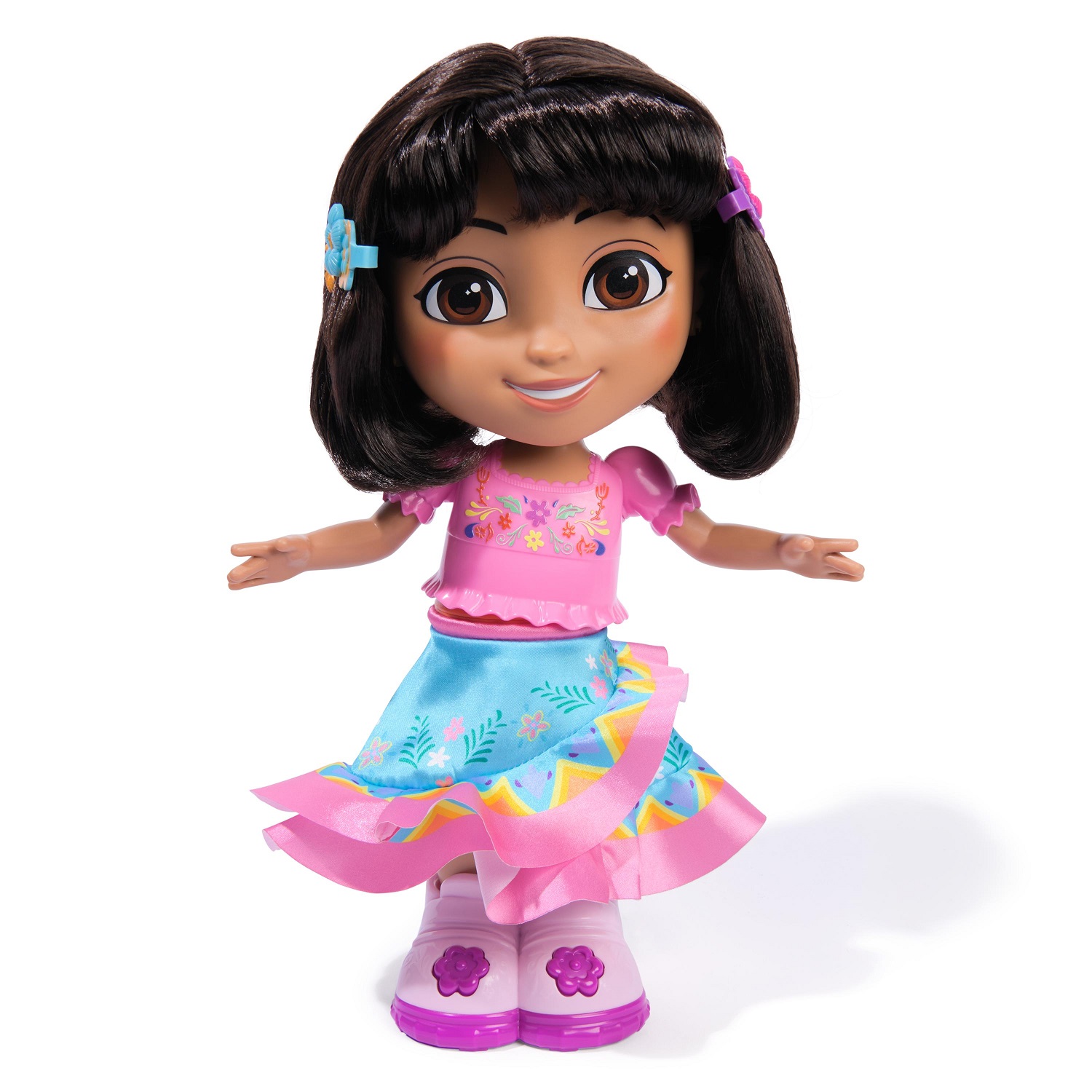 Dora the Explorer doll with colorful, patterned details in box
