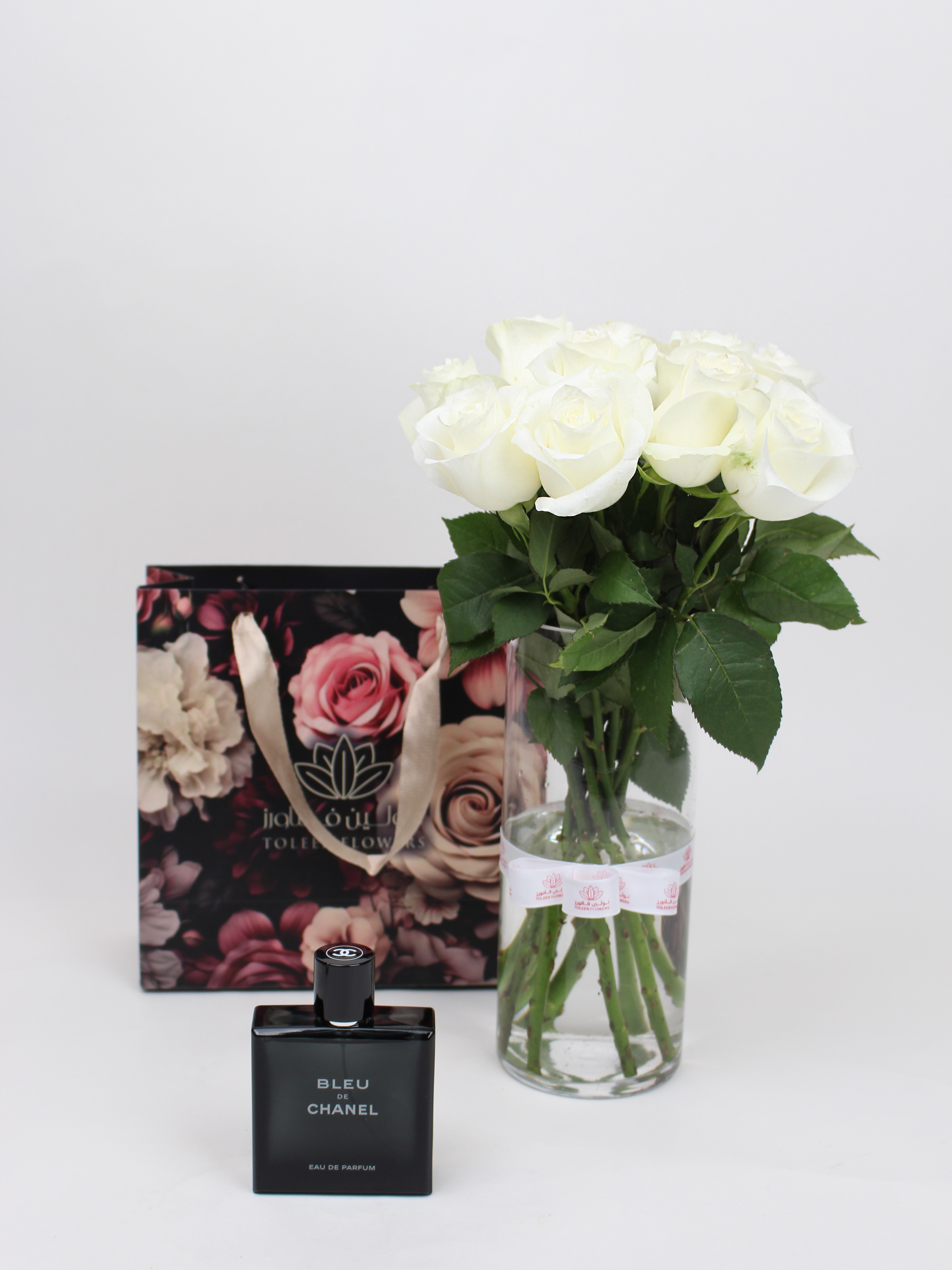  Elegant vase and Bleu de Chanel perfume for men 