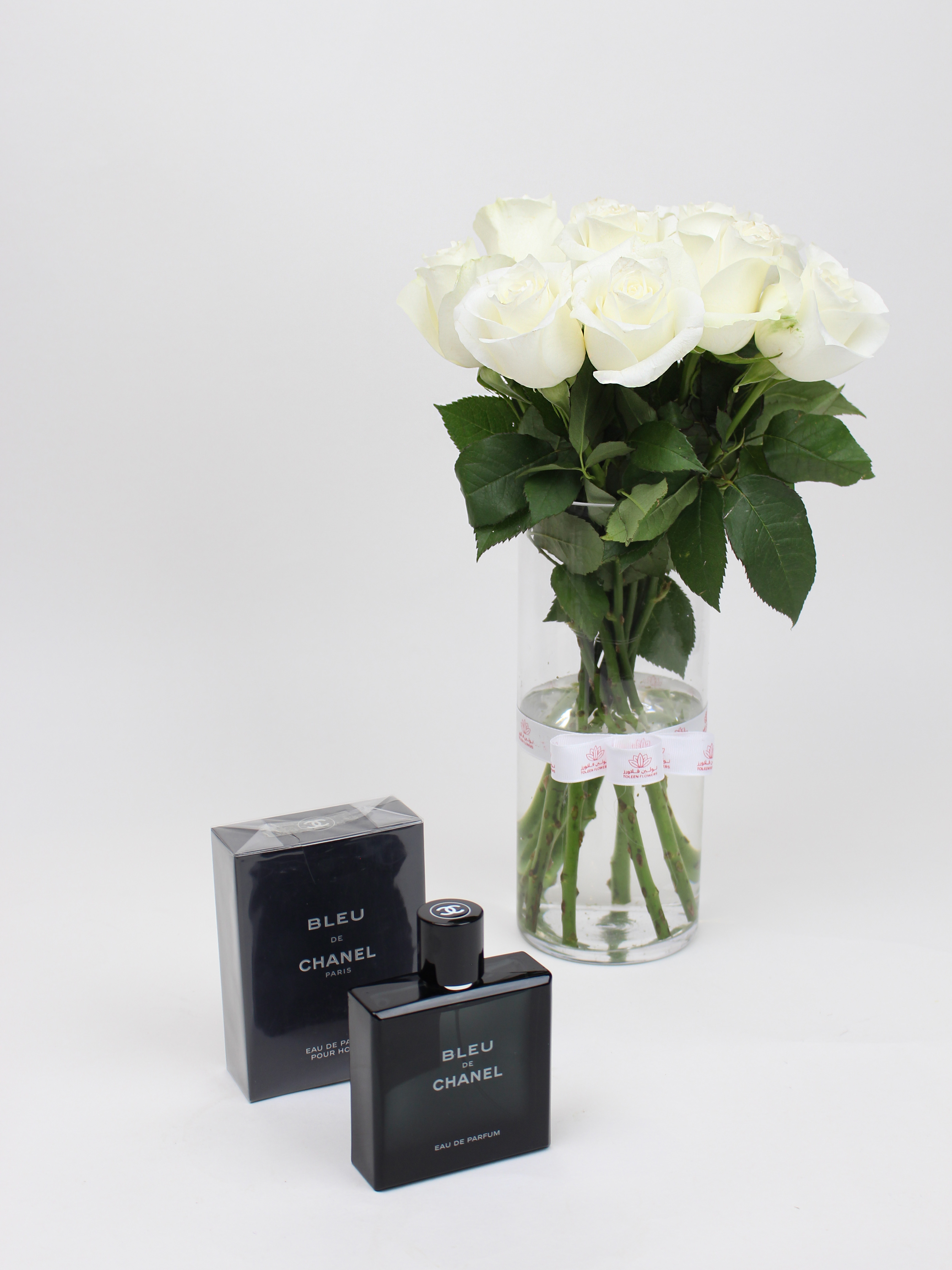  Elegant vase and Bleu de Chanel perfume for men 