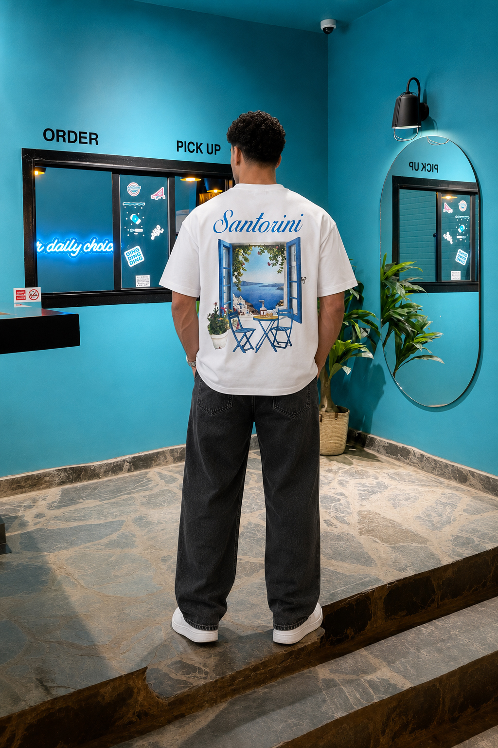 تيشيرت NOVUS BRAND Santorini Bloom أبيض - منظر خلفي على موديل بتصميم Santorini