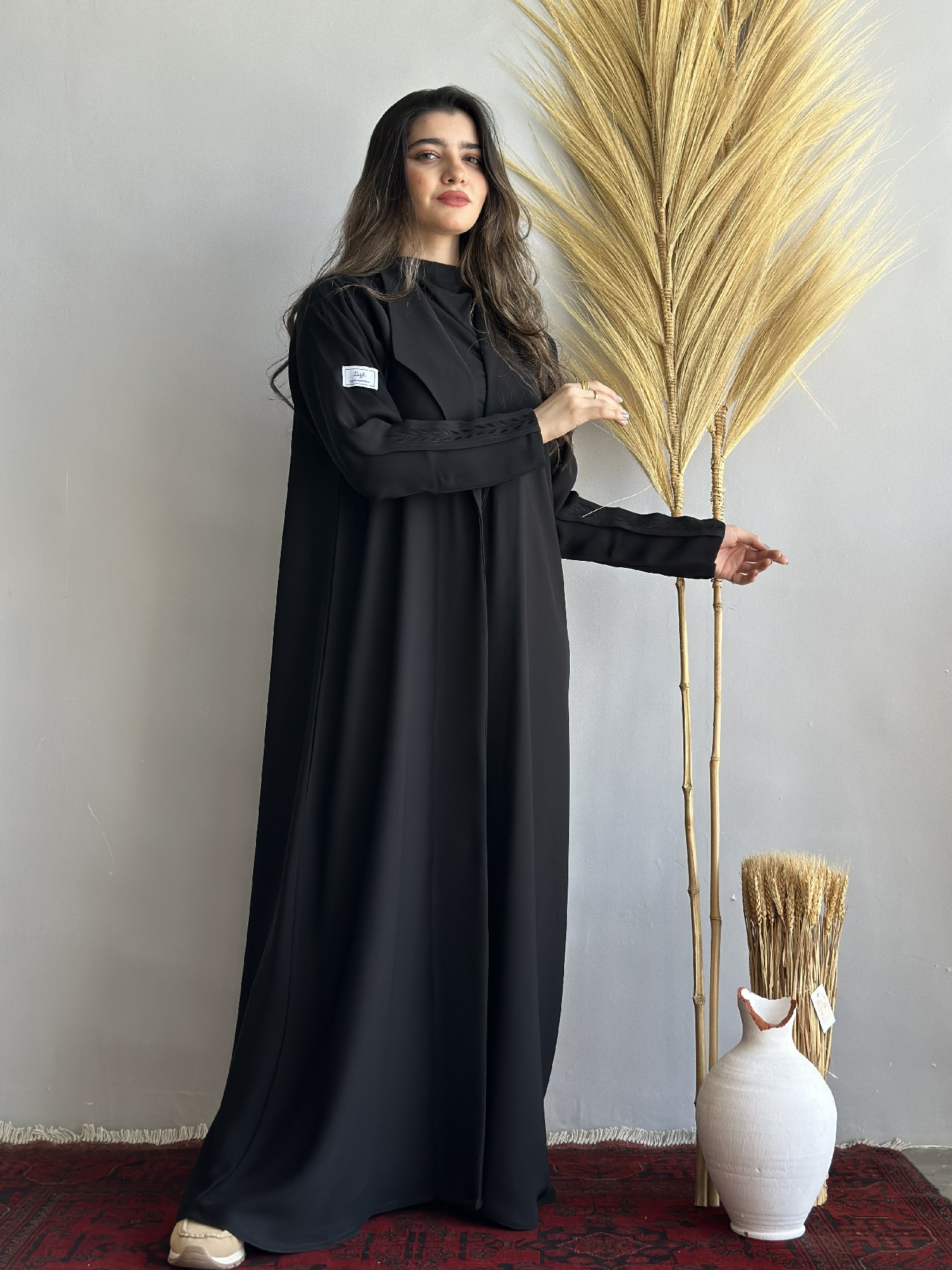 عباية سوداء عناقيد
