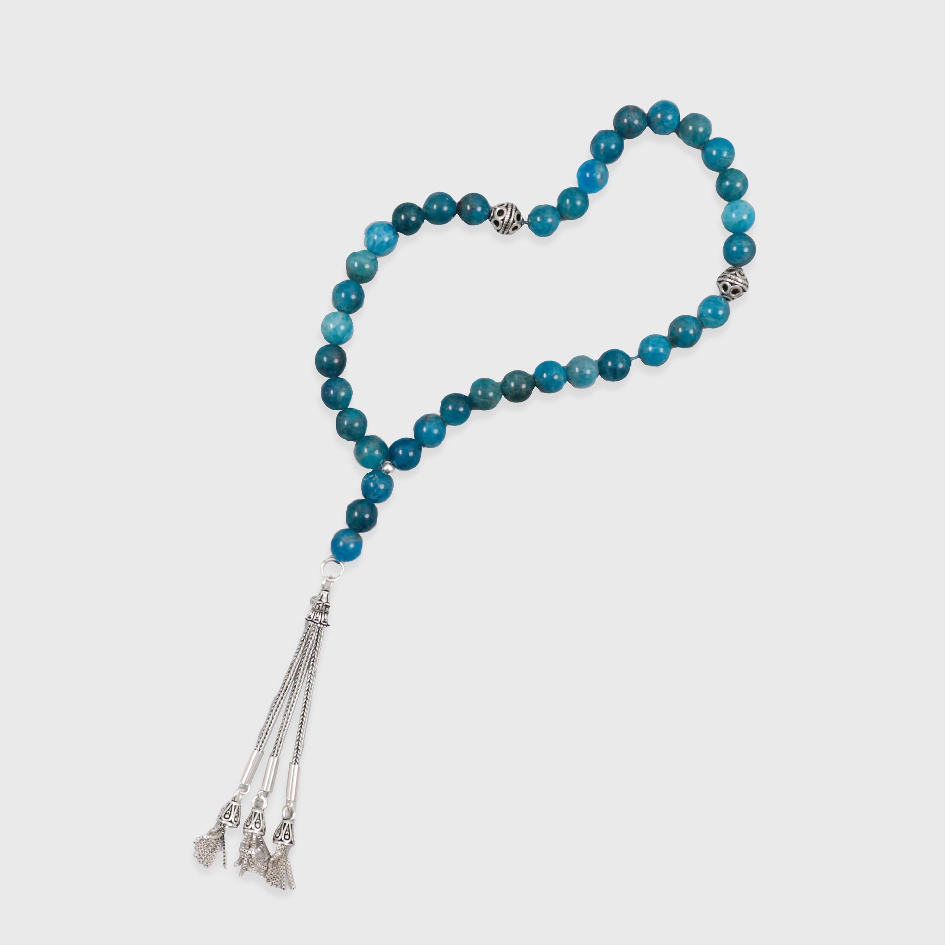 Close-up of Raseel blue apatite prayer beads
