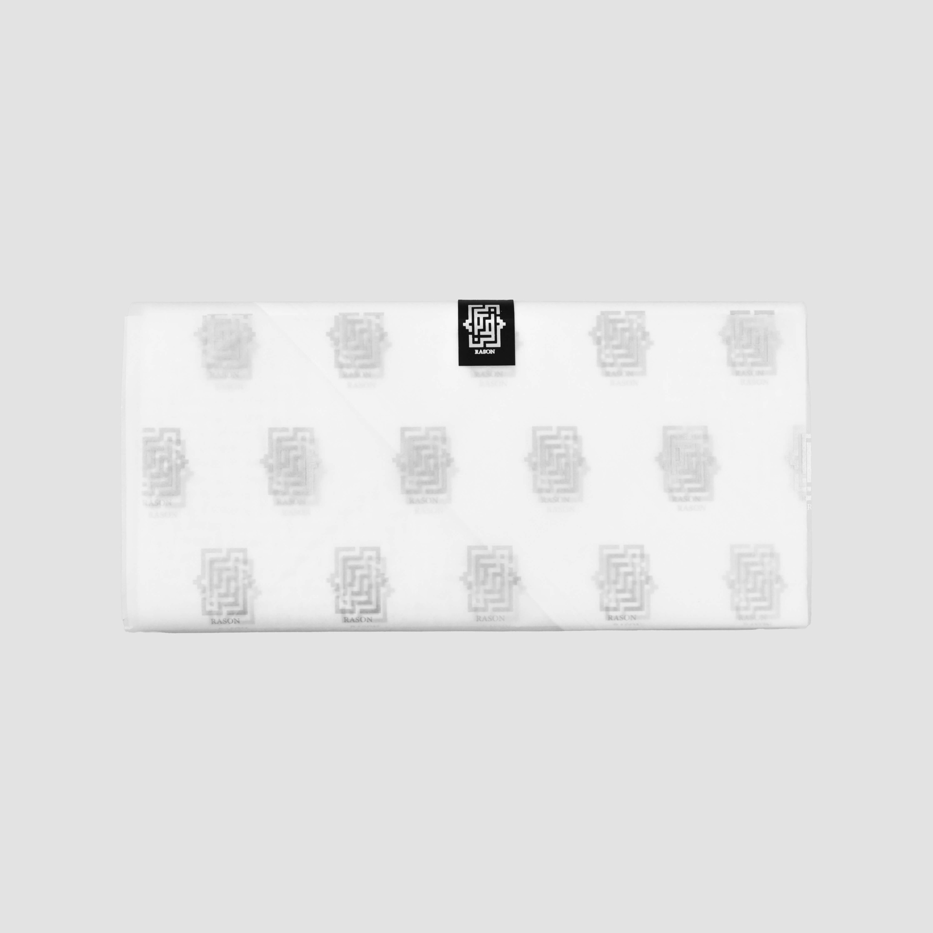 Raseel's premium gift packaging with the white shemagh