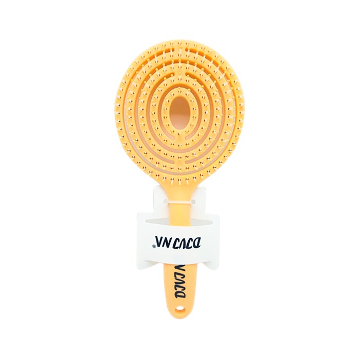Plastic hair brush with holes