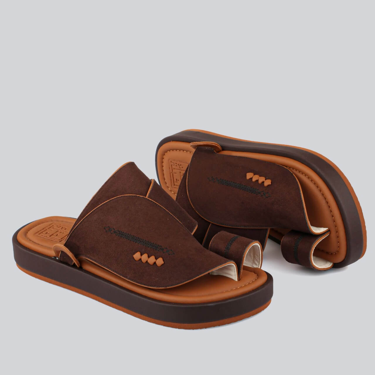 Luxurious brown suede slippers with a honey-colored sole, featuring a stylish, high & durable sole