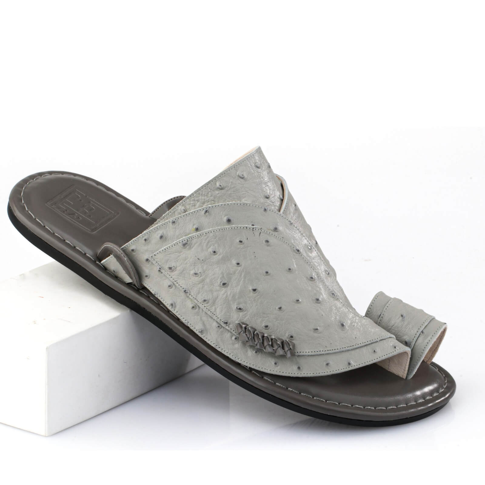 Flexible orthopedic sole design of a high-quality grey oriental shoe