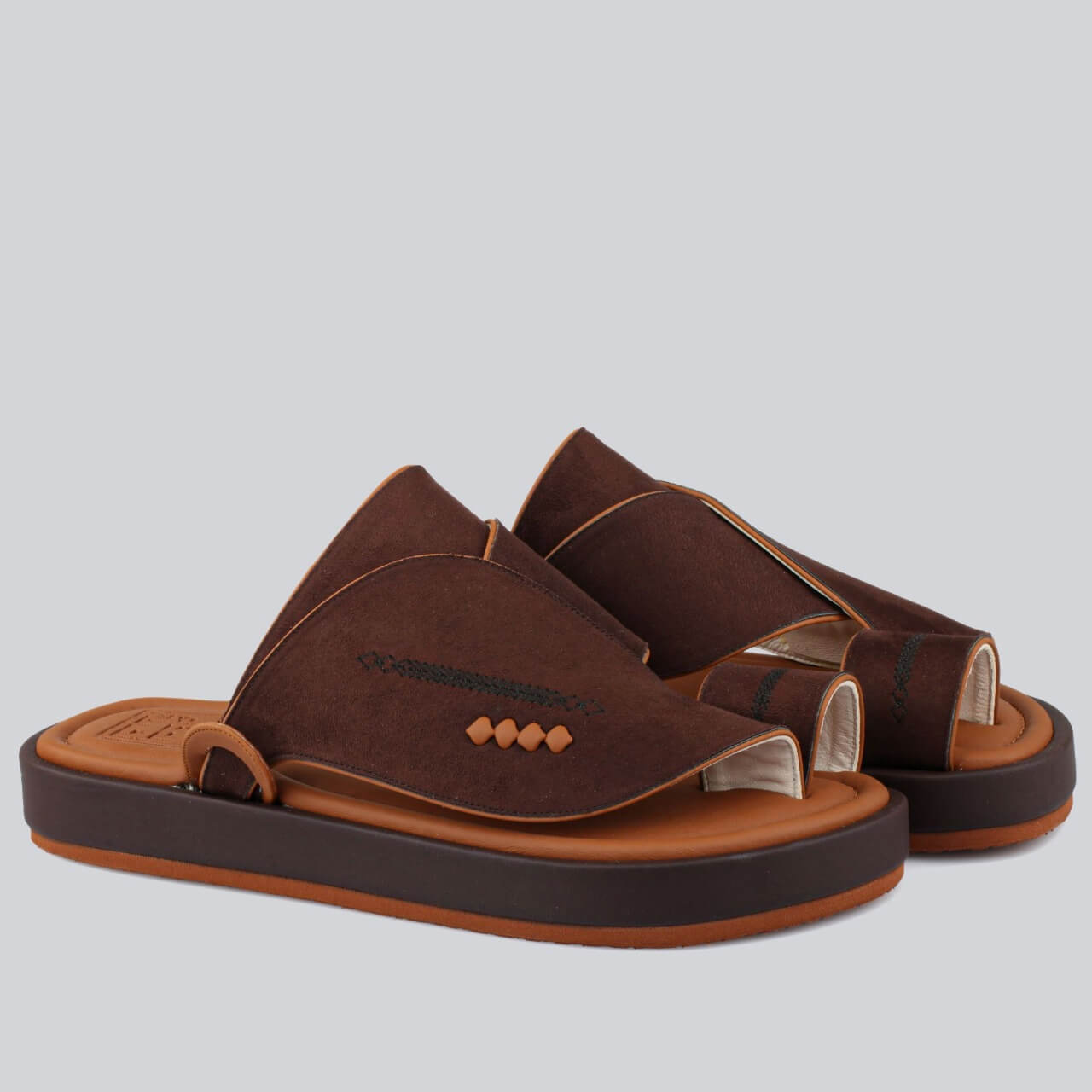 Luxurious brown suede slippers with a honey-colored sole, featuring a stylish, high & durable sole