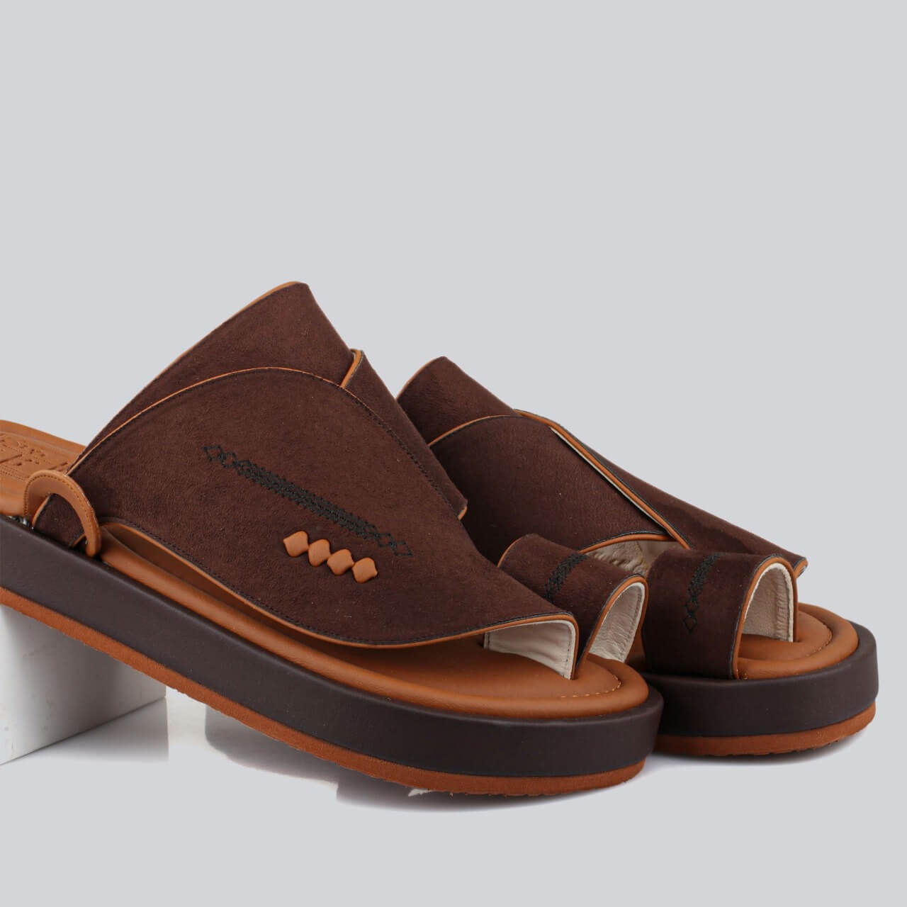 Luxurious brown suede slippers with a honey-colored sole, featuring a stylish, high & durable sole