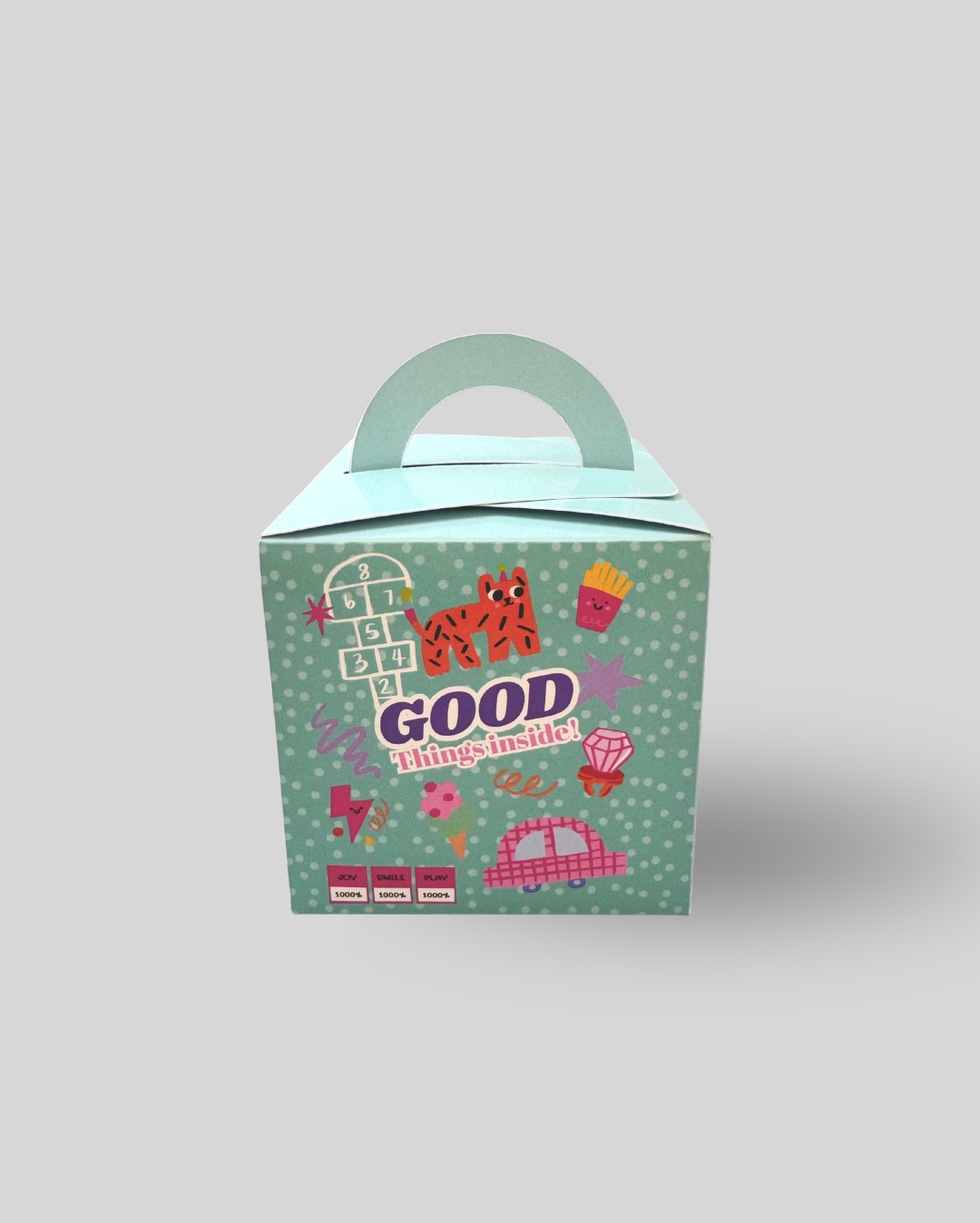 تصميم مختلف من علبة Good Things Inside للأطفال بألوان ورسومات مرحة.
