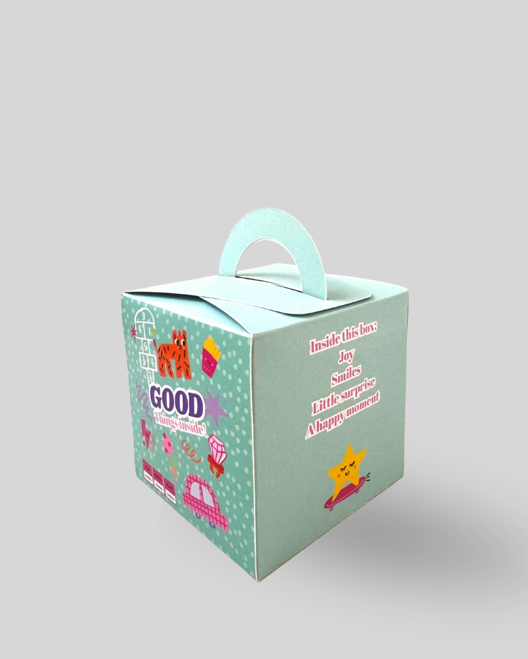 جانب علبة Good Things Inside مزود بعبارات إيجابية وتصميم مرح للأطفال.