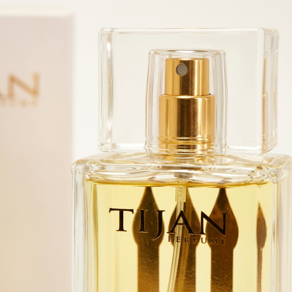  عطر تيجان 100 مل 