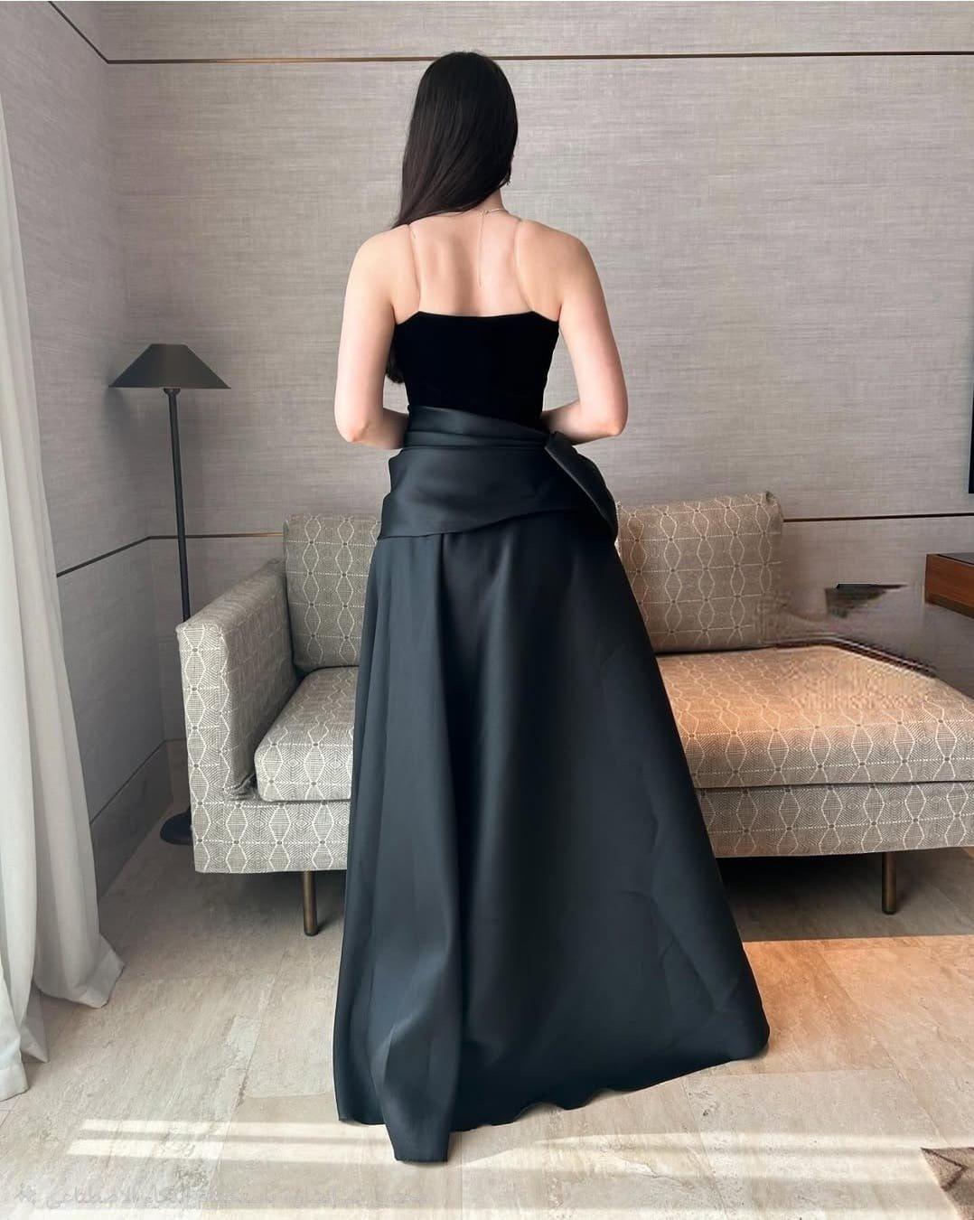 فستان سهرة أسود بفيونكه ملكي 