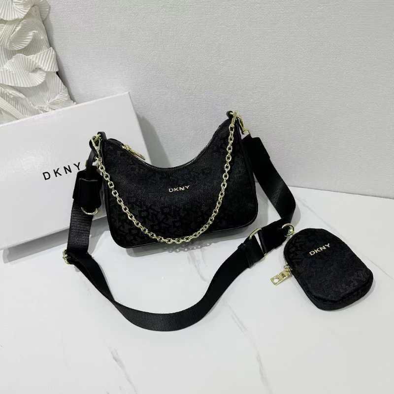  شنطة نسائية ماركة دكني  