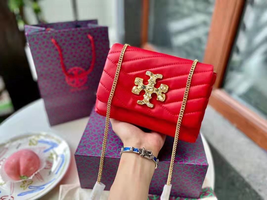  شنطة يد نسائية ماركة توري بورش 