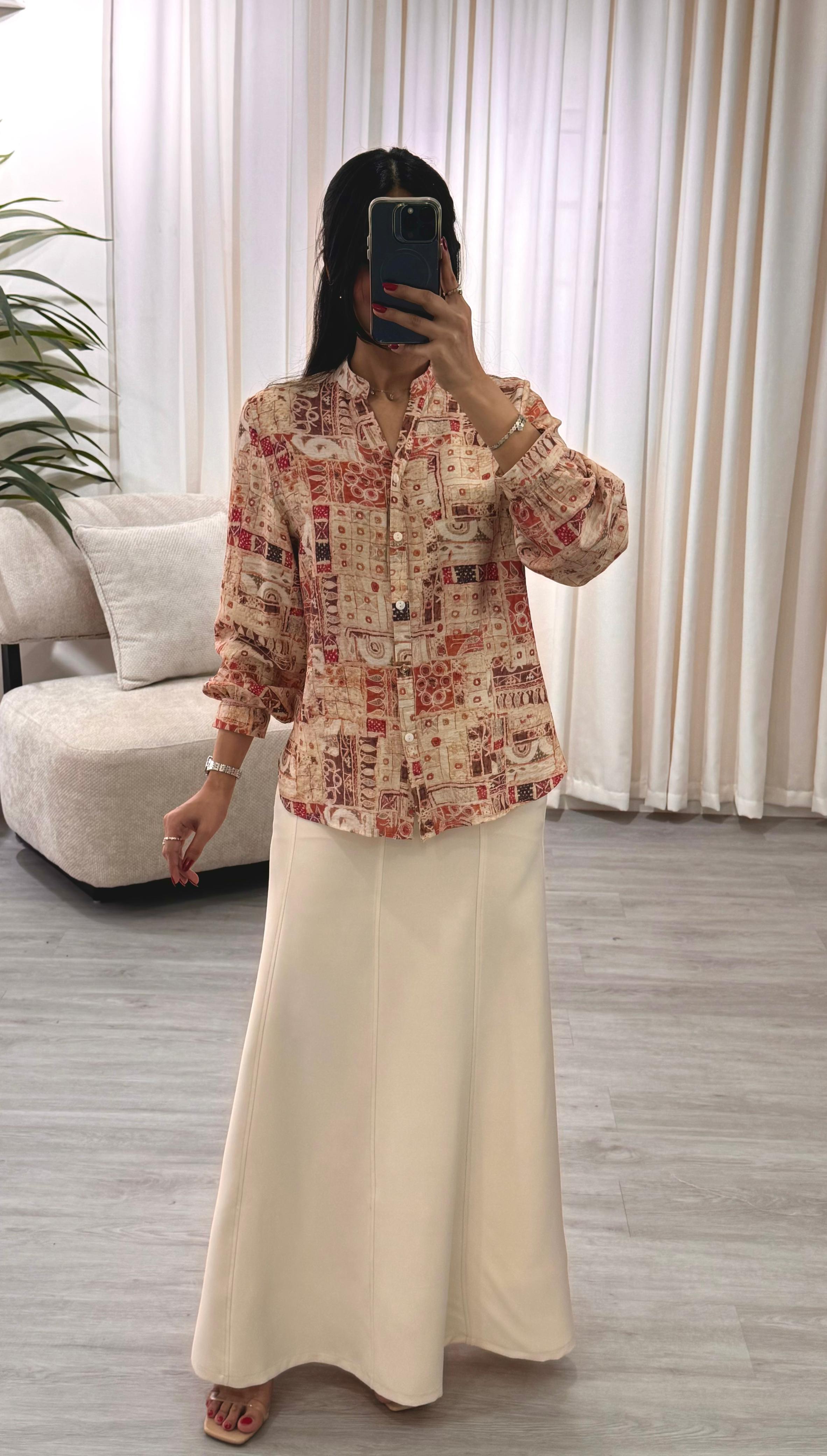  طقم بلوزة و تنورة 
