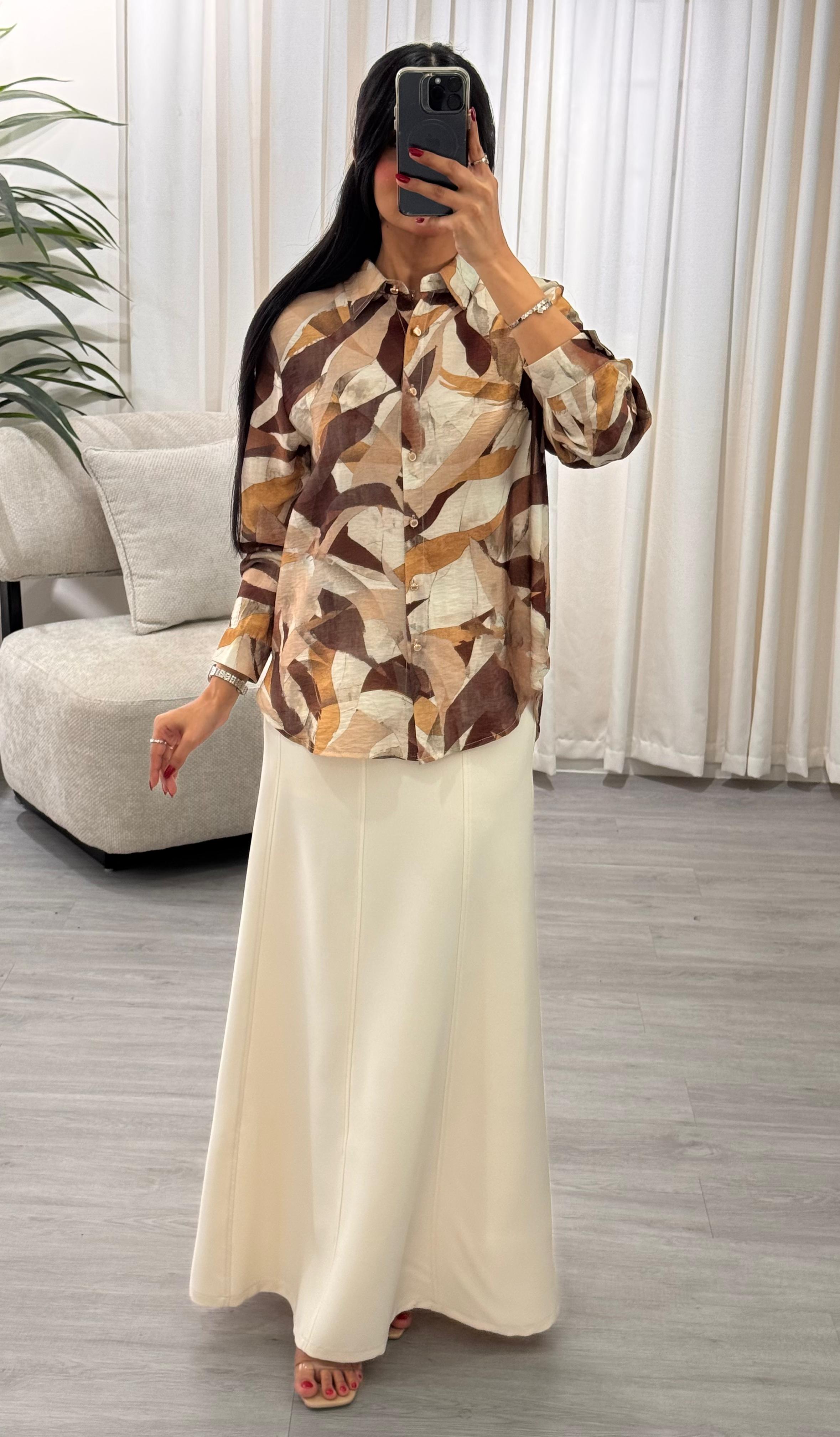  طقم بلوزة مشجرة مع تنورة 