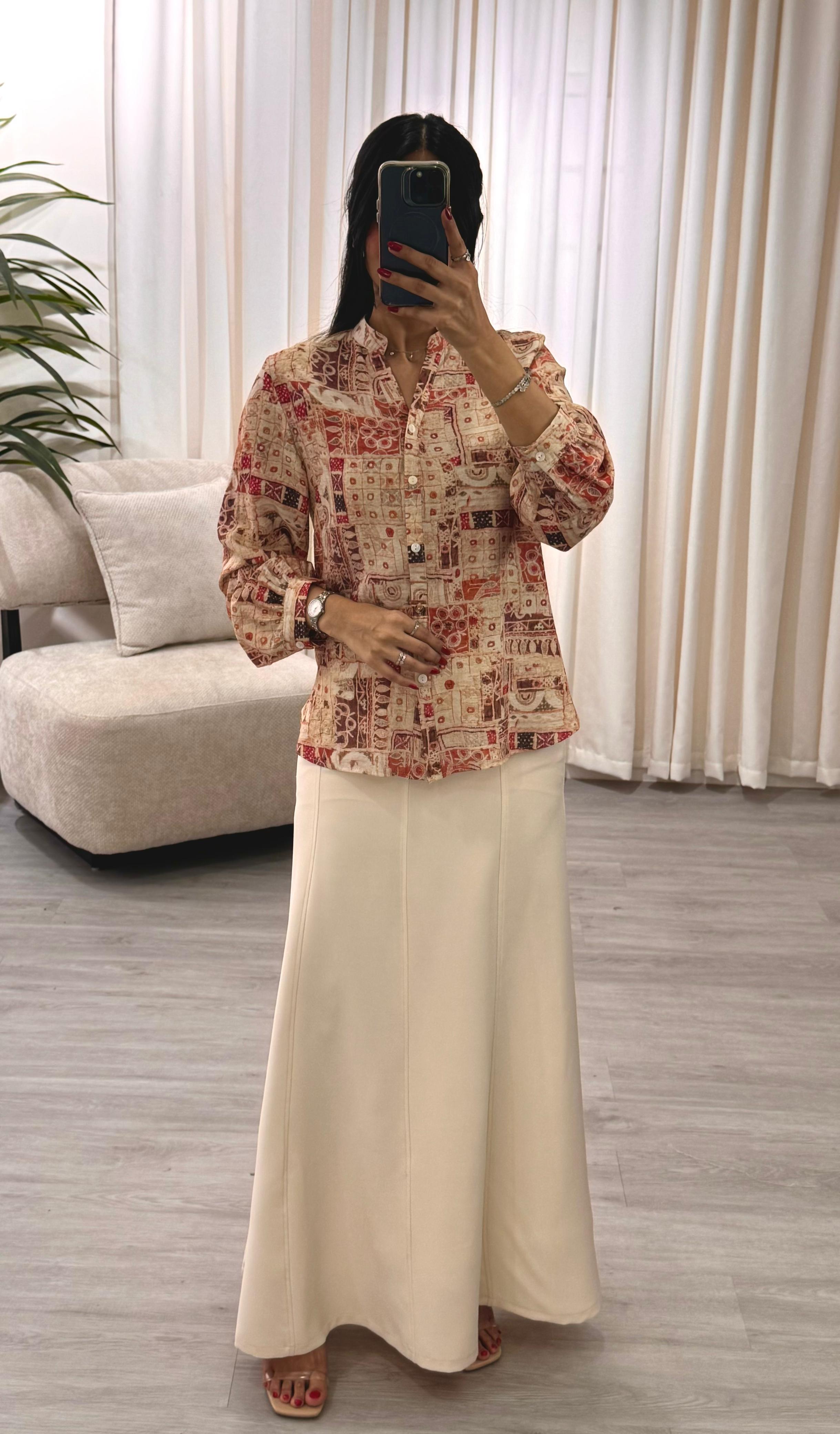  طقم بلوزة و تنورة 