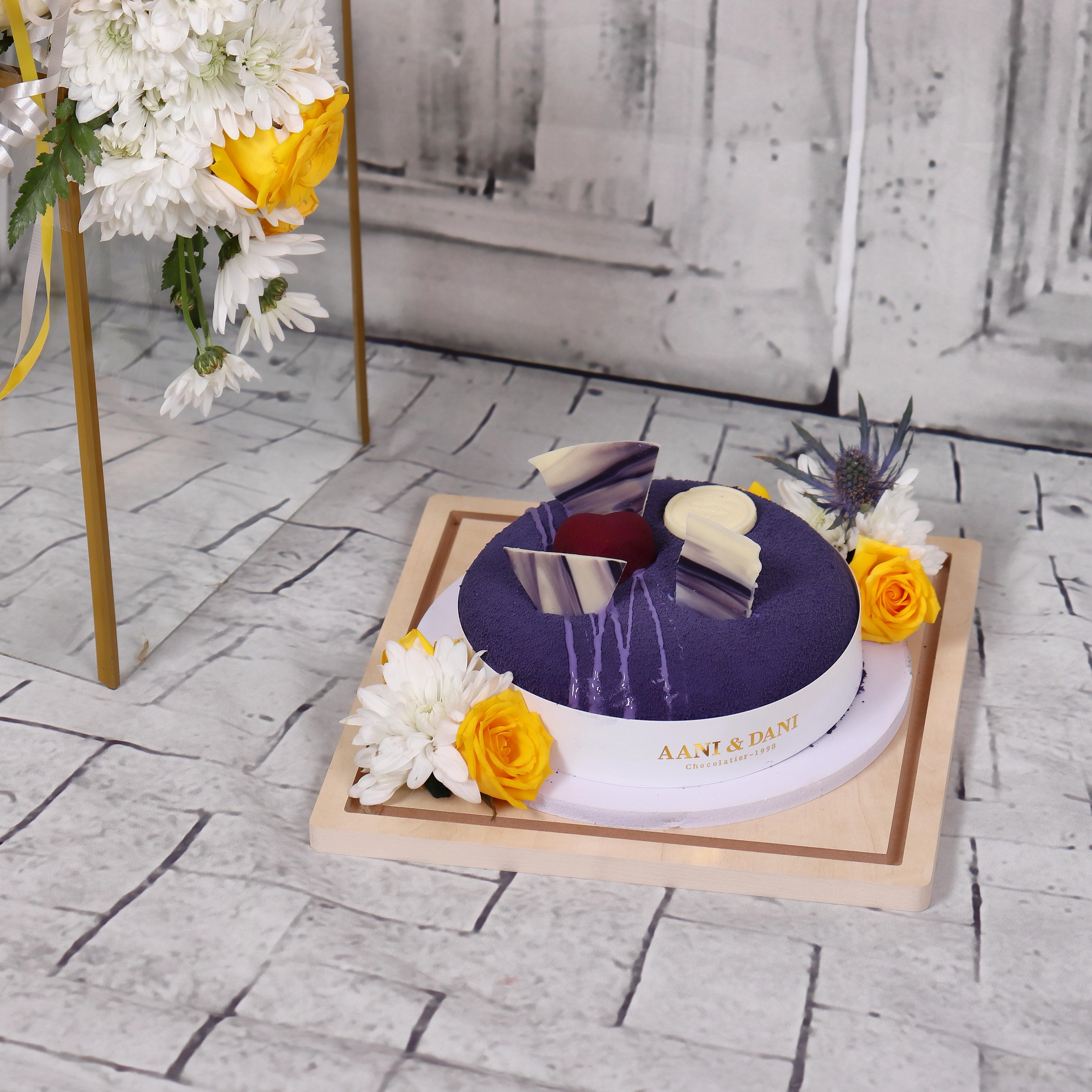 Cake With Flowers and Balloons 