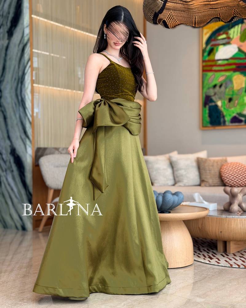 Olive green evening dress with a velvet bodice