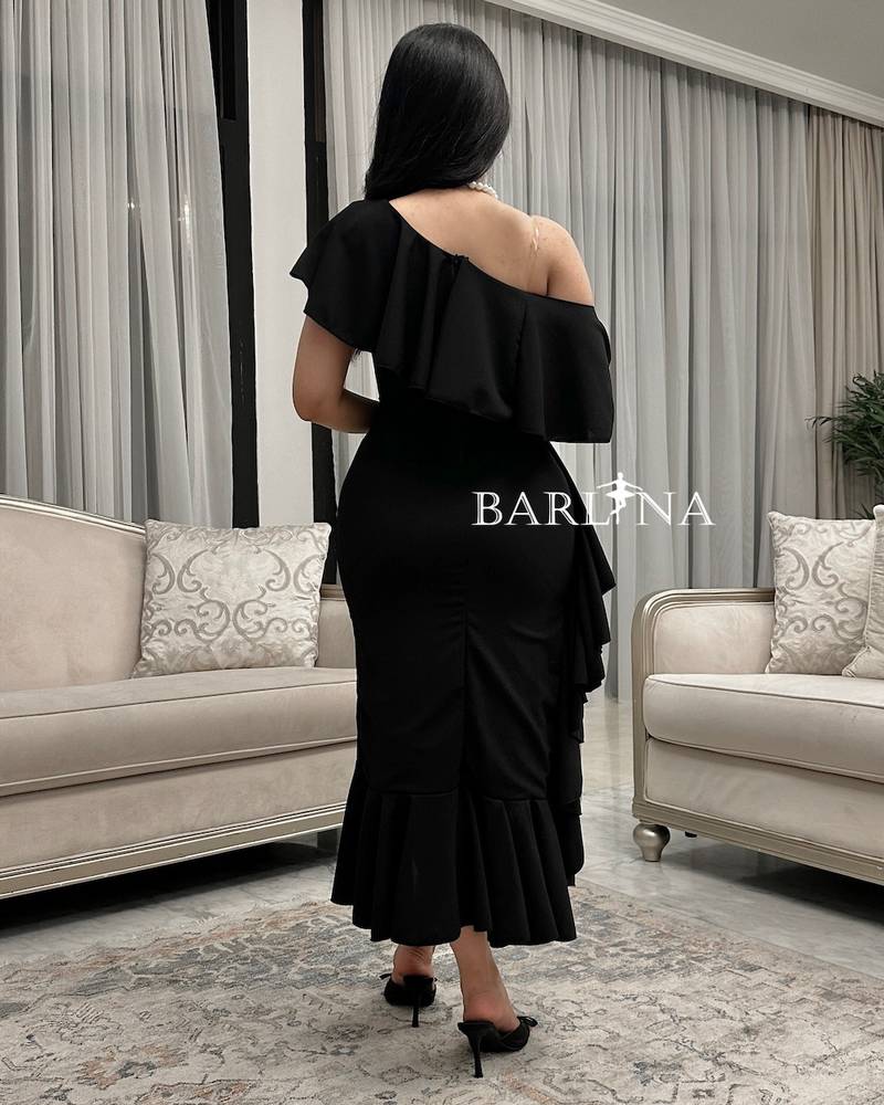 Black midi dress with side ruffle design