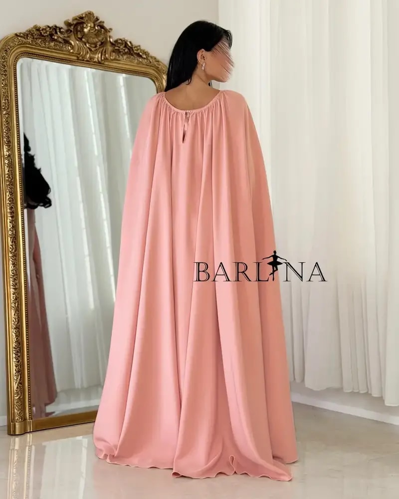 Pink occasion dress with a wide cape
