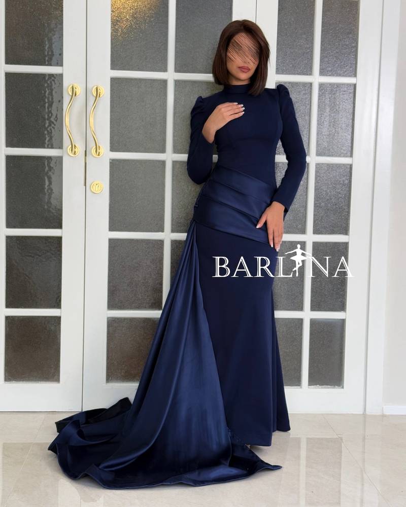 Navy blue dress with a royal cut and a side train