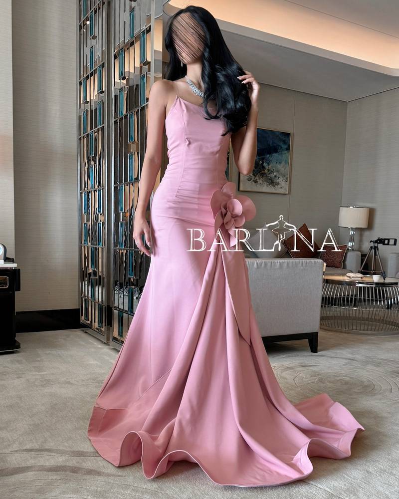 Long pink evening dress with a wide bottom