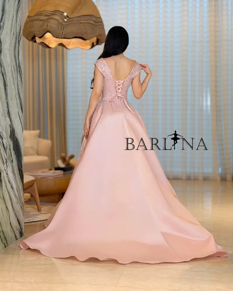 Evening dress with a full skirt and elegant embroidery