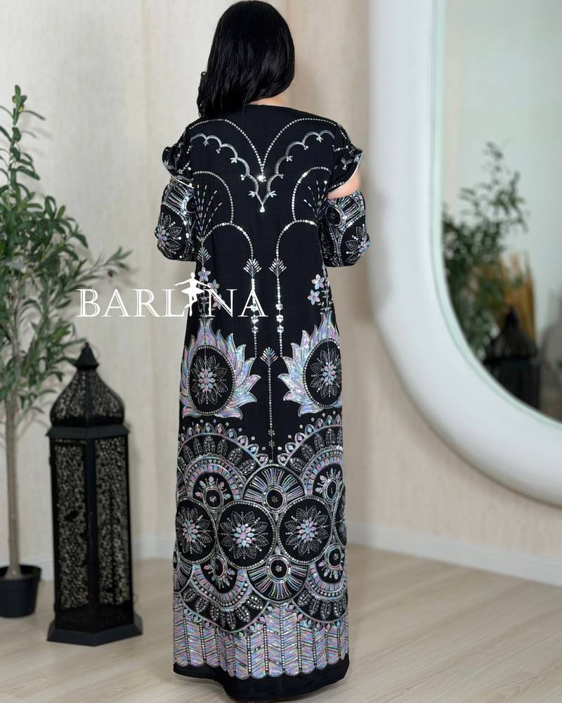 Pink jalabiya with a black embroidered cape
