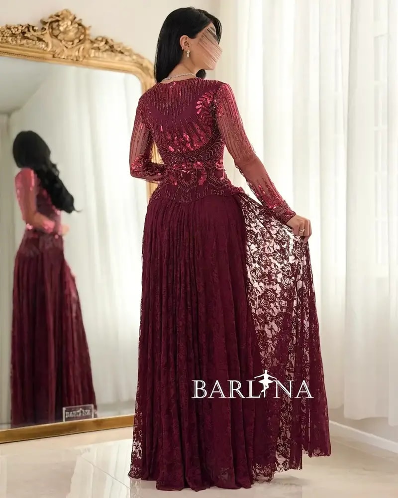Lace evening dress with embroidered bodice