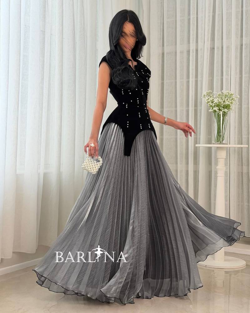An elegant dress with a modern design and shimmering details