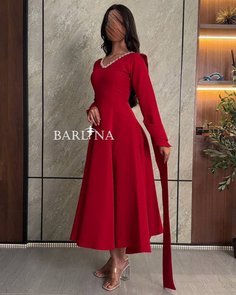 Red dress with off the shoulder detail