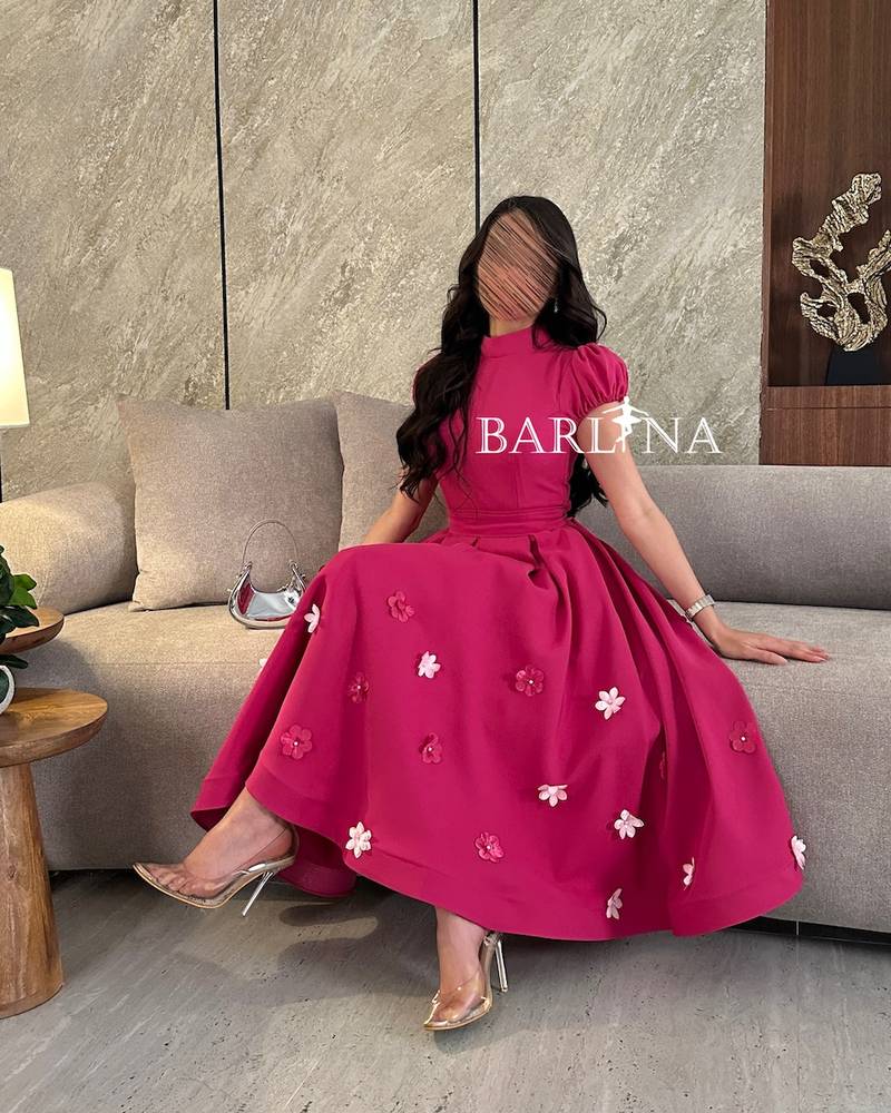 Fuchsia midi dress with short puff sleeves