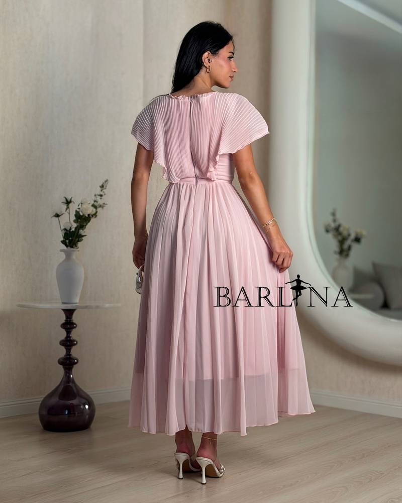 Pink pleated midi dress with a side rose