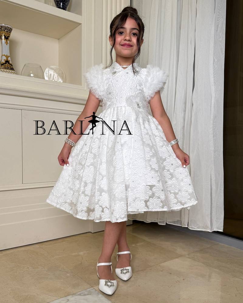 Girls' white dress with floral fabric