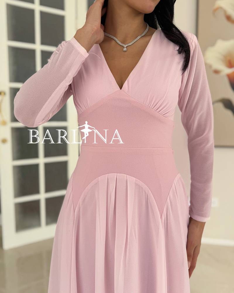 A light pink dress with soft and simple details