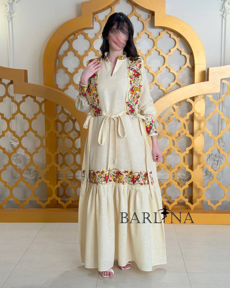 Beige jalabiya with colorful embroidery and a waist belt