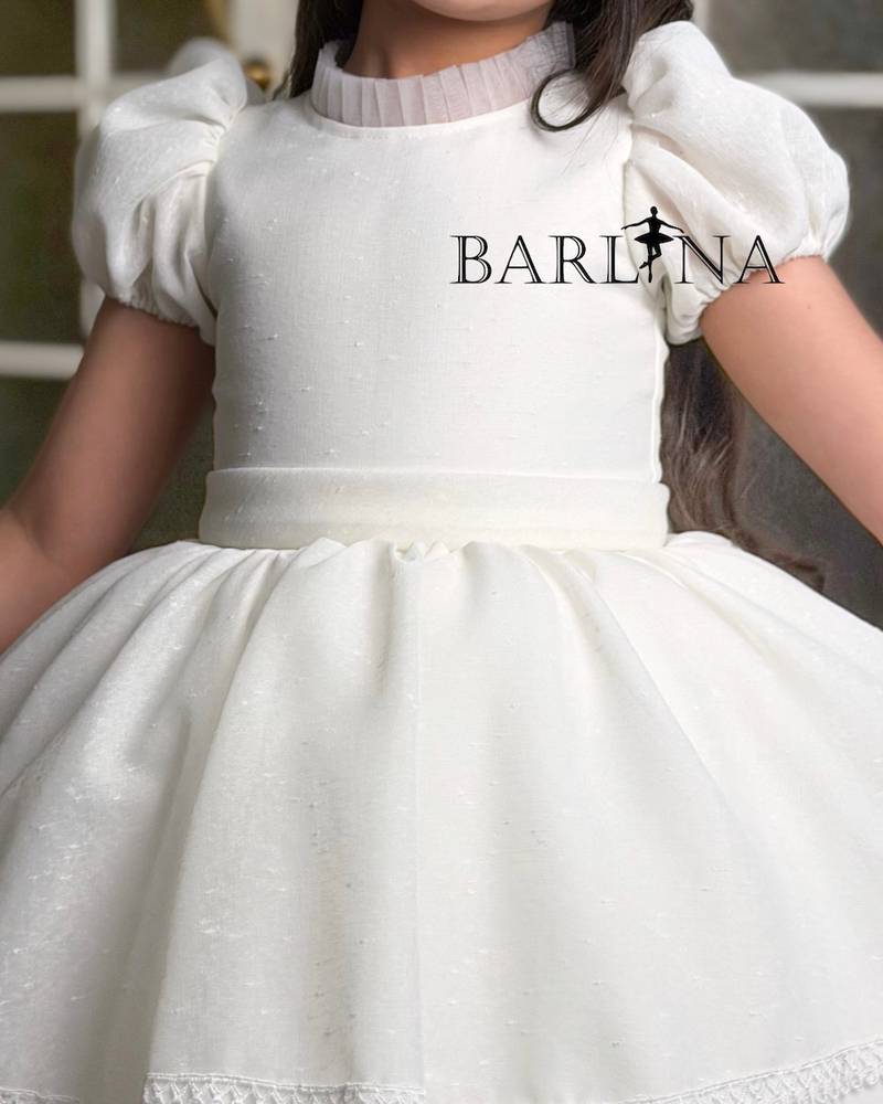white fluffy girl's dress with short sleeves
