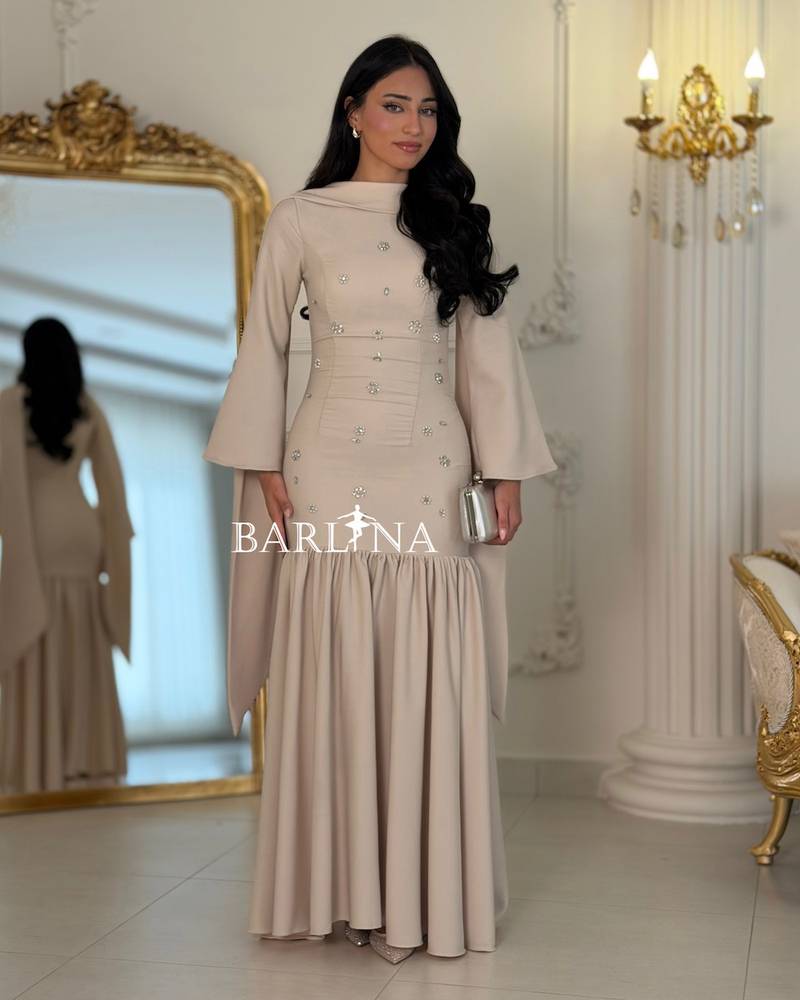 Long beige dress with shimmering details